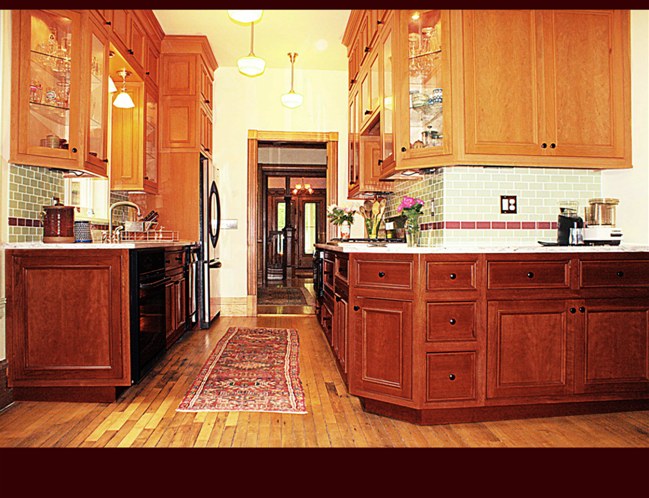 Cherry Kitchen Cabinets. Lower cabinets stained 'Traditional Cherry'. Upper Cabinets are 'Natural Stain'.