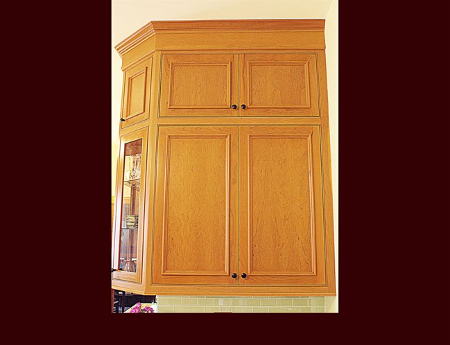 Cherry Kitchen Cabinetry. Four piece custom crown molding.