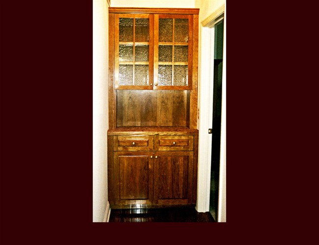 Cherry Butler's Pantry Cabinet. Raised Panel door style. Antique Glass doors in wall cabinets.